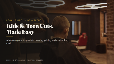 Barber blending a young client's haircut with clippers at Republic Of Barbers, Unley Road, Malvern